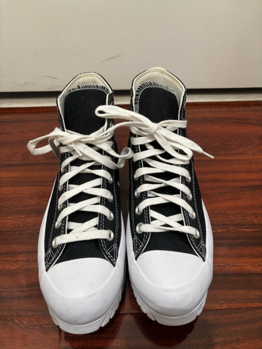 Black High-Top Converse Sneakers with White Sole and Laces